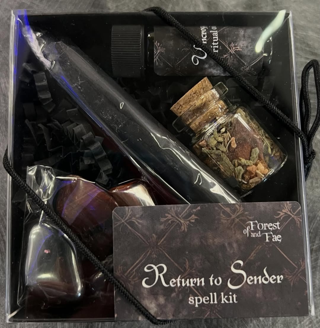 Return to Sender spell kit by Forest and Fae with candle, ritual oil, herb jar and crystals